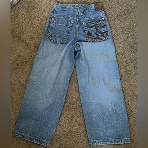 kids blue jeans with cool back pockets